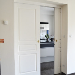 Les portes à galandages dans les Maisons Auton'home pour un maximum de décloisonnement et d'espace